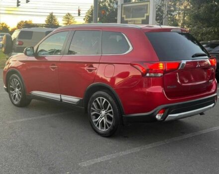 Красный Мицубиси Аутлендер, объемом двигателя 3 л и пробегом 71 тыс. км за 3400 $, фото 3 на Automoto.ua