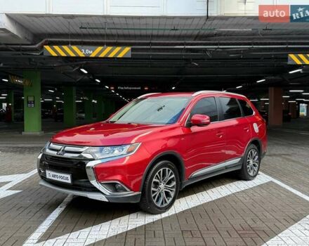 Красный Мицубиси Аутлендер, объемом двигателя 3 л и пробегом 167 тыс. км за 16990 $, фото 3 на Automoto.ua