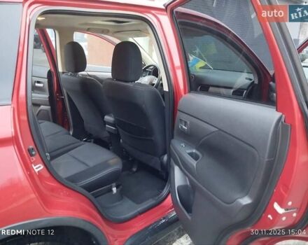 Красный Мицубиси Аутлендер, объемом двигателя 2.36 л и пробегом 118 тыс. км за 14000 $, фото 8 на Automoto.ua