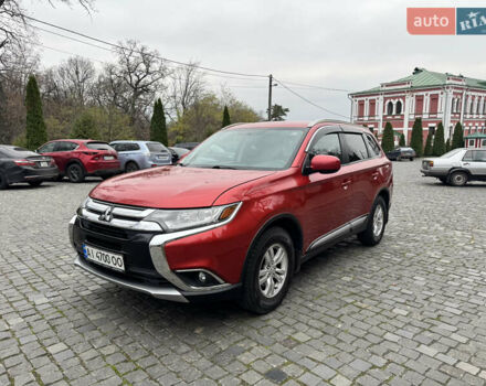 Красный Мицубиси Аутлендер, объемом двигателя 2.4 л и пробегом 225 тыс. км за 11900 $, фото 2 на Automoto.ua