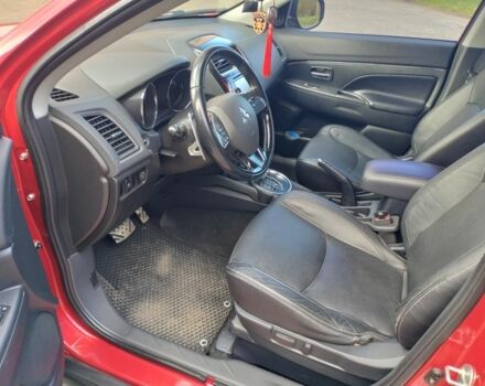 Красный Мицубиси Аутлендер, объемом двигателя 2.4 л и пробегом 185 тыс. км за 12200 $, фото 10 на Automoto.ua