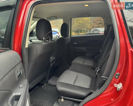 Красный Мицубиси Аутлендер, объемом двигателя 2.4 л и пробегом 225 тыс. км за 11900 $, фото 8 на Automoto.ua