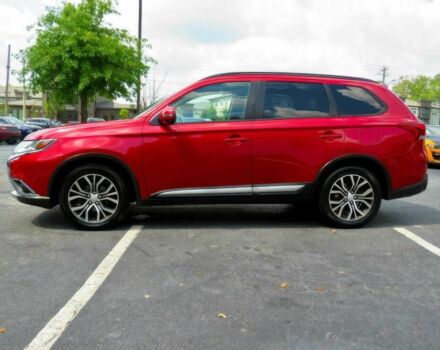 Червоний Міцубісі Аутлендер, об'ємом двигуна 2.4 л та пробігом 71 тис. км за 10800 $, фото 6 на Automoto.ua