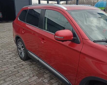 Красный Мицубиси Аутлендер, объемом двигателя 2.36 л и пробегом 131 тыс. км за 16300 $, фото 6 на Automoto.ua