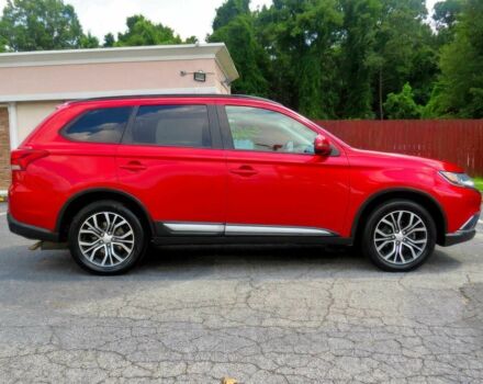 Красный Мицубиси Аутлендер, объемом двигателя 2.4 л и пробегом 70 тыс. км за 2400 $, фото 4 на Automoto.ua