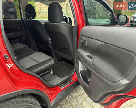 Красный Мицубиси Аутлендер, объемом двигателя 2.4 л и пробегом 225 тыс. км за 11900 $, фото 10 на Automoto.ua