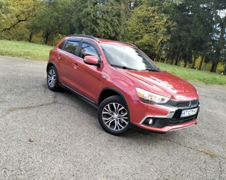 Красный Мицубиси Аутлендер, объемом двигателя 2.4 л и пробегом 185 тыс. км за 12200 $, фото 5 на Automoto.ua