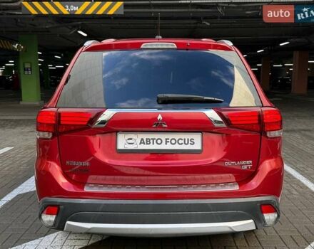 Красный Мицубиси Аутлендер, объемом двигателя 3 л и пробегом 167 тыс. км за 16990 $, фото 8 на Automoto.ua