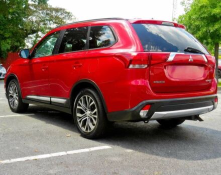 Червоний Міцубісі Аутлендер, об'ємом двигуна 2.4 л та пробігом 71 тис. км за 10800 $, фото 5 на Automoto.ua