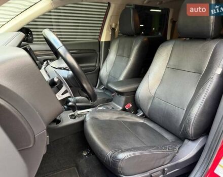 Красный Мицубиси Аутлендер, объемом двигателя 3 л и пробегом 167 тыс. км за 16990 $, фото 10 на Automoto.ua