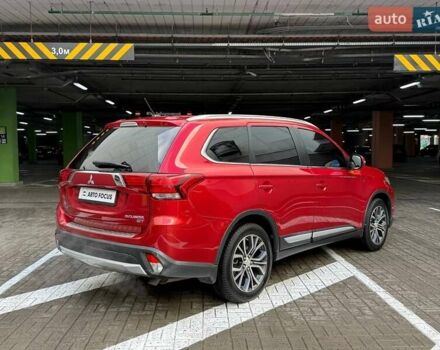 Красный Мицубиси Аутлендер, объемом двигателя 3 л и пробегом 167 тыс. км за 16990 $, фото 6 на Automoto.ua