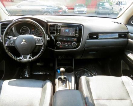 Червоний Міцубісі Аутлендер, об'ємом двигуна 2.4 л та пробігом 71 тис. км за 10800 $, фото 7 на Automoto.ua