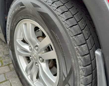 Красный Мицубиси Аутлендер, объемом двигателя 2.4 л и пробегом 225 тыс. км за 11900 $, фото 9 на Automoto.ua