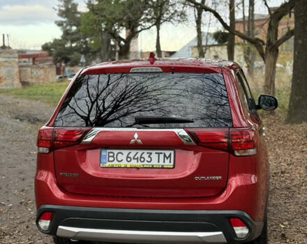 Червоний Міцубісі Аутлендер, об'ємом двигуна 2.36 л та пробігом 190 тис. км за 12000 $, фото 4 на Automoto.ua