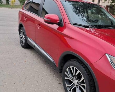 Мицубиси Аутлендер 2016 в Жашкове на Automoto.ua Красный Мицубиси Аутлендер, объемом двигателя 2.36 л и пробегом 270 тыс. км за 12500 $, фото 2 на Automoto.ua