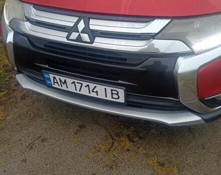 Красный Мицубиси Аутлендер, объемом двигателя 2.36 л и пробегом 131 тыс. км за 16300 $, фото 1 на Automoto.ua