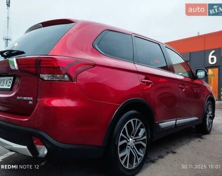 Красный Мицубиси Аутлендер, объемом двигателя 2.36 л и пробегом 118 тыс. км за 14000 $, фото 13 на Automoto.ua