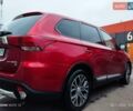 Красный Мицубиси Аутлендер, объемом двигателя 2.36 л и пробегом 118 тыс. км за 14000 $, фото 13 на Automoto.ua