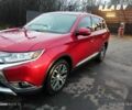 Червоний Міцубісі Аутлендер, об'ємом двигуна 2.4 л та пробігом 117 тис. км за 14000 $, фото 2 на Automoto.ua
