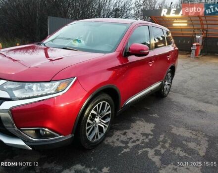 Красный Мицубиси Аутлендер, объемом двигателя 2.36 л и пробегом 118 тыс. км за 14000 $, фото 2 на Automoto.ua