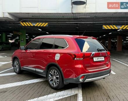 Красный Мицубиси Аутлендер, объемом двигателя 3 л и пробегом 167 тыс. км за 16990 $, фото 4 на Automoto.ua