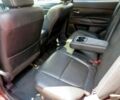 Красный Мицубиси Аутлендер, объемом двигателя 2.4 л и пробегом 70 тыс. км за 2400 $, фото 9 на Automoto.ua