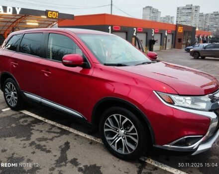 Червоний Міцубісі Аутлендер, об'ємом двигуна 2.4 л та пробігом 117 тис. км за 14000 $, фото 1 на Automoto.ua