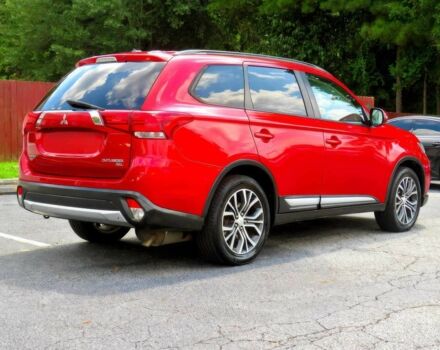 Червоний Міцубісі Аутлендер, об'ємом двигуна 2.4 л та пробігом 71 тис. км за 10800 $, фото 3 на Automoto.ua