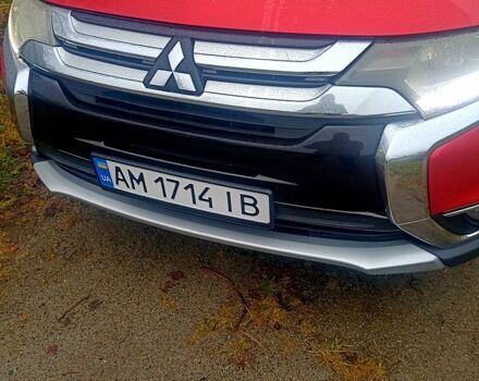 Червоний Міцубісі Аутлендер, об'ємом двигуна 2.4 л та пробігом 131 тис. км за 16300 $, фото 1 на Automoto.ua