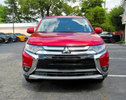 Червоний Міцубісі Аутлендер, об'ємом двигуна 2.4 л та пробігом 71 тис. км за 10800 $, фото 1 на Automoto.ua