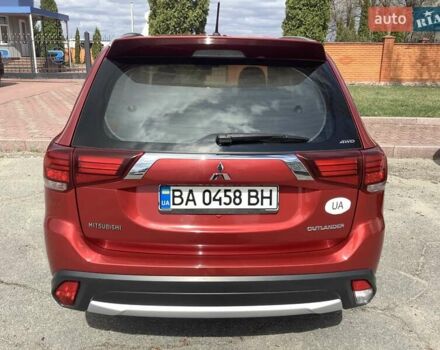 Красный Мицубиси Аутлендер, объемом двигателя 2.4 л и пробегом 90 тыс. км за 19000 $, фото 2 на Automoto.ua