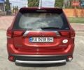 Красный Мицубиси Аутлендер, объемом двигателя 2.4 л и пробегом 90 тыс. км за 19000 $, фото 2 на Automoto.ua