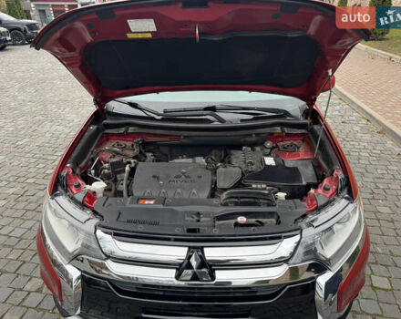 Красный Мицубиси Аутлендер, объемом двигателя 2.4 л и пробегом 225 тыс. км за 11900 $, фото 14 на Automoto.ua