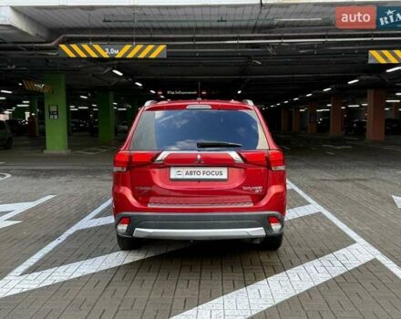 Красный Мицубиси Аутлендер, объемом двигателя 3 л и пробегом 167 тыс. км за 16990 $, фото 5 на Automoto.ua