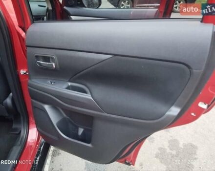 Красный Мицубиси Аутлендер, объемом двигателя 2.36 л и пробегом 118 тыс. км за 14000 $, фото 9 на Automoto.ua