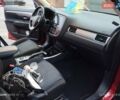Красный Мицубиси Аутлендер, объемом двигателя 2.36 л и пробегом 118 тыс. км за 14000 $, фото 5 на Automoto.ua