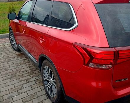 Червоний Міцубісі Аутлендер, об'ємом двигуна 2.4 л та пробігом 131 тис. км за 16300 $, фото 3 на Automoto.ua