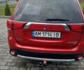 Красный Мицубиси Аутлендер, объемом двигателя 2.36 л и пробегом 131 тыс. км за 16300 $, фото 2 на Automoto.ua