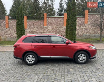 Красный Мицубиси Аутлендер, объемом двигателя 2.4 л и пробегом 225 тыс. км за 11900 $, фото 4 на Automoto.ua