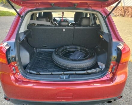 Красный Мицубиси Аутлендер, объемом двигателя 2.4 л и пробегом 185 тыс. км за 12200 $, фото 23 на Automoto.ua