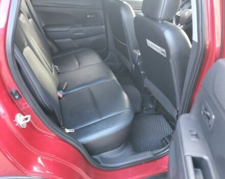 Красный Мицубиси Аутлендер, объемом двигателя 2.4 л и пробегом 185 тыс. км за 12200 $, фото 15 на Automoto.ua