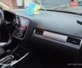 Красный Мицубиси Аутлендер, объемом двигателя 2.36 л и пробегом 118 тыс. км за 14000 $, фото 6 на Automoto.ua