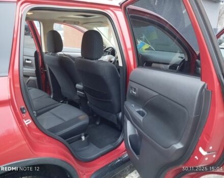 Червоний Міцубісі Аутлендер, об'ємом двигуна 2.4 л та пробігом 117 тис. км за 14000 $, фото 9 на Automoto.ua