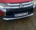Красный Мицубиси Аутлендер, объемом двигателя 2.36 л и пробегом 131 тыс. км за 16300 $, фото 1 на Automoto.ua
