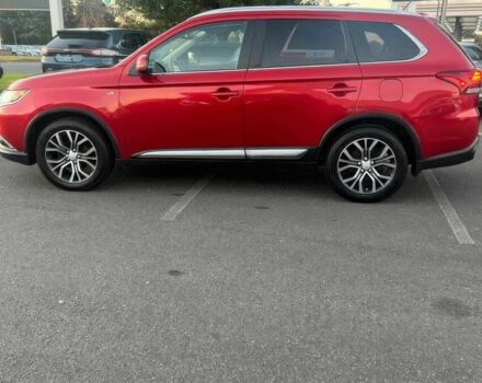 Красный Мицубиси Аутлендер, объемом двигателя 3 л и пробегом 71 тыс. км за 3400 $, фото 4 на Automoto.ua