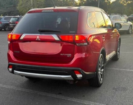 Красный Мицубиси Аутлендер, объемом двигателя 3 л и пробегом 71 тыс. км за 3400 $, фото 2 на Automoto.ua