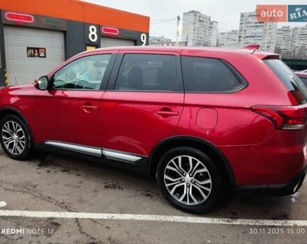 Красный Мицубиси Аутлендер, объемом двигателя 2.36 л и пробегом 118 тыс. км за 14000 $, фото 11 на Automoto.ua