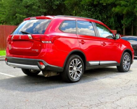 Красный Мицубиси Аутлендер, объемом двигателя 2.4 л и пробегом 70 тыс. км за 2400 $, фото 3 на Automoto.ua