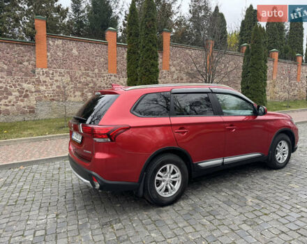 Красный Мицубиси Аутлендер, объемом двигателя 2.4 л и пробегом 225 тыс. км за 11900 $, фото 5 на Automoto.ua