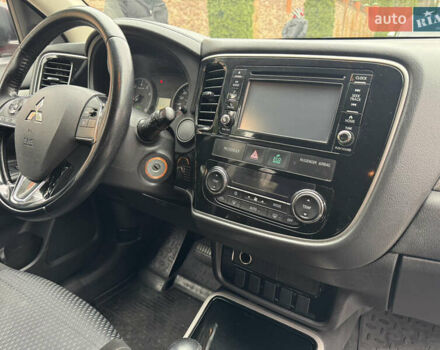 Красный Мицубиси Аутлендер, объемом двигателя 2.4 л и пробегом 225 тыс. км за 11900 $, фото 11 на Automoto.ua